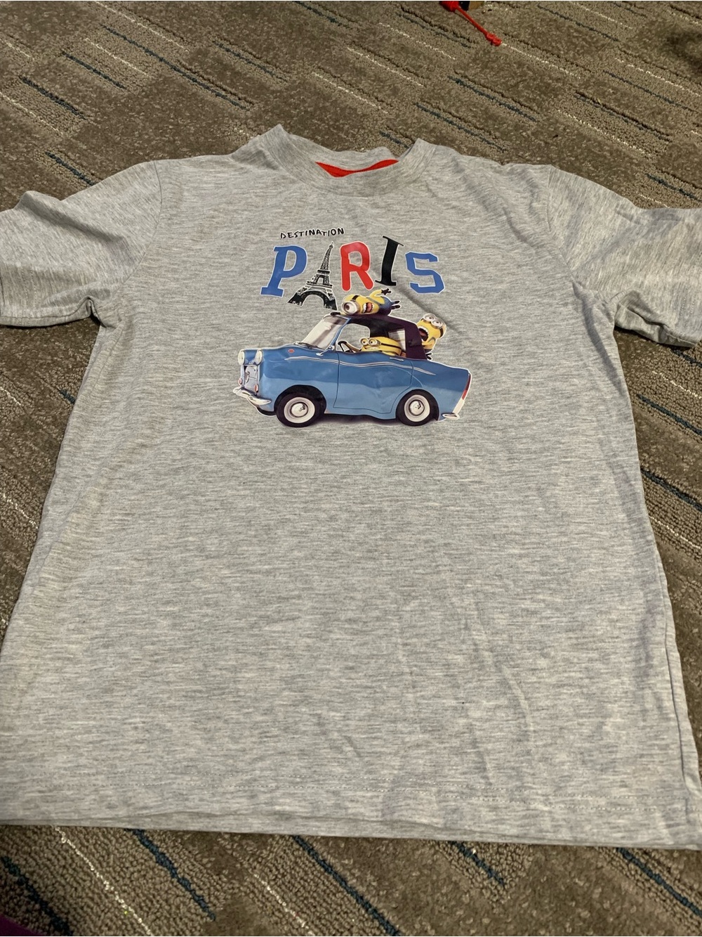 Universal Gray Tee with Orange 'Despicable Me' Logo and Red Trim